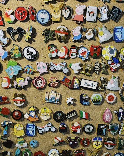 Wall of enamel pins and collectible badges